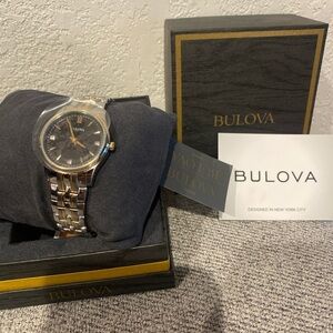 Bulova Women's Silver and Gold Watch